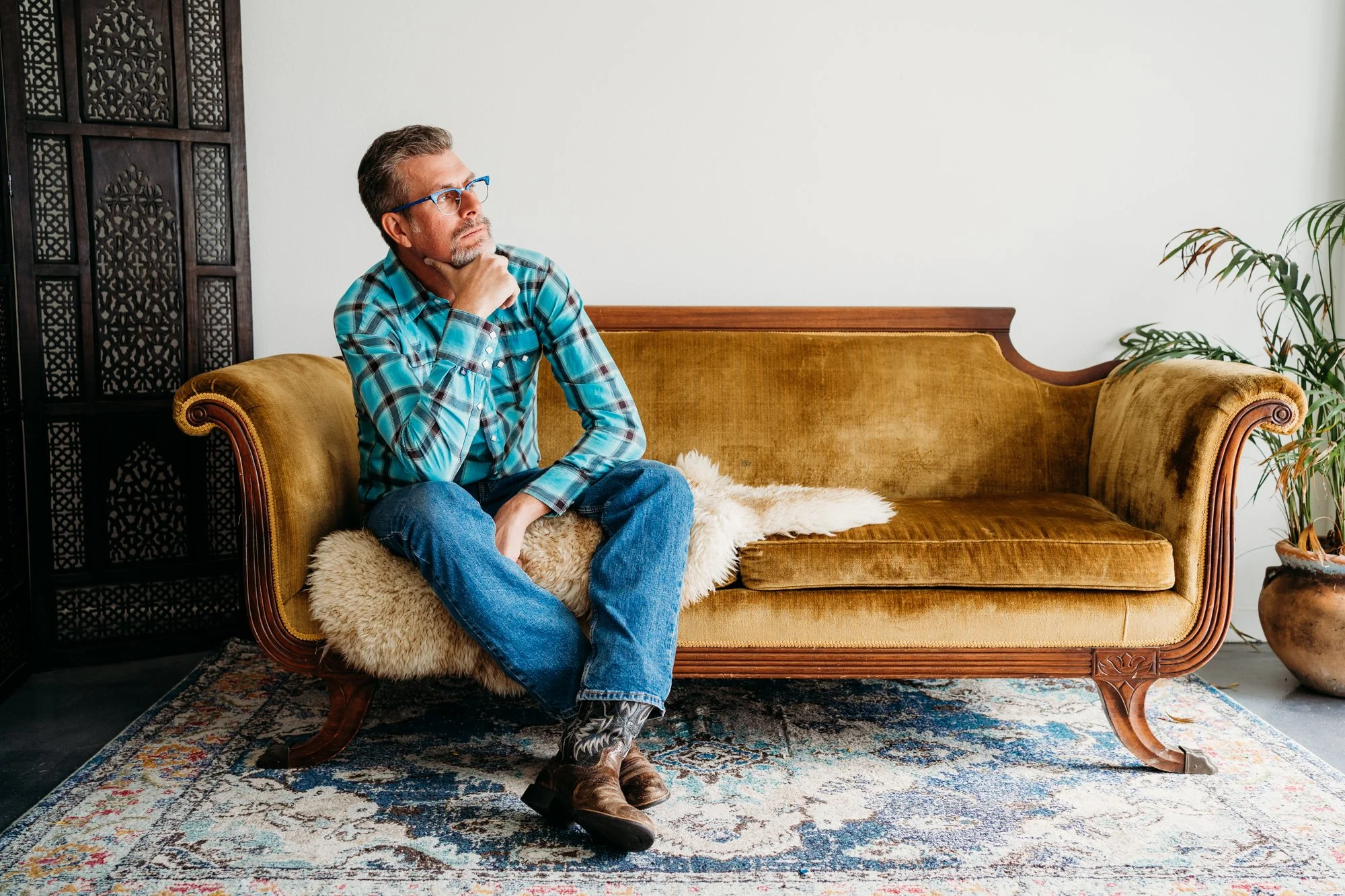 Scott Dory relaxing on a couch